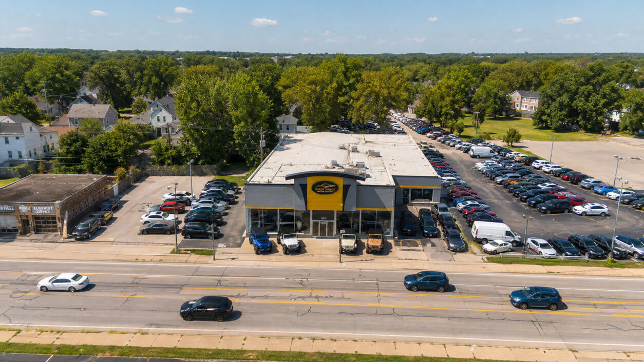 Aerial view of Tradewinds Motor Center and its used vehicle lot on Lorain Avenue in Cleveland, Ohio