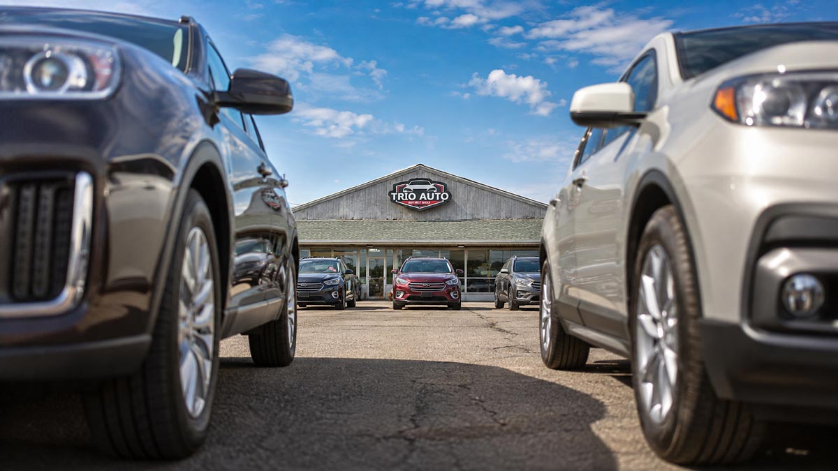Used vehicles on the lot at Trio Auto in Elyria, Ohio